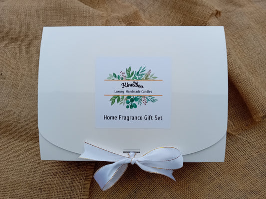 White box with white and gold bow