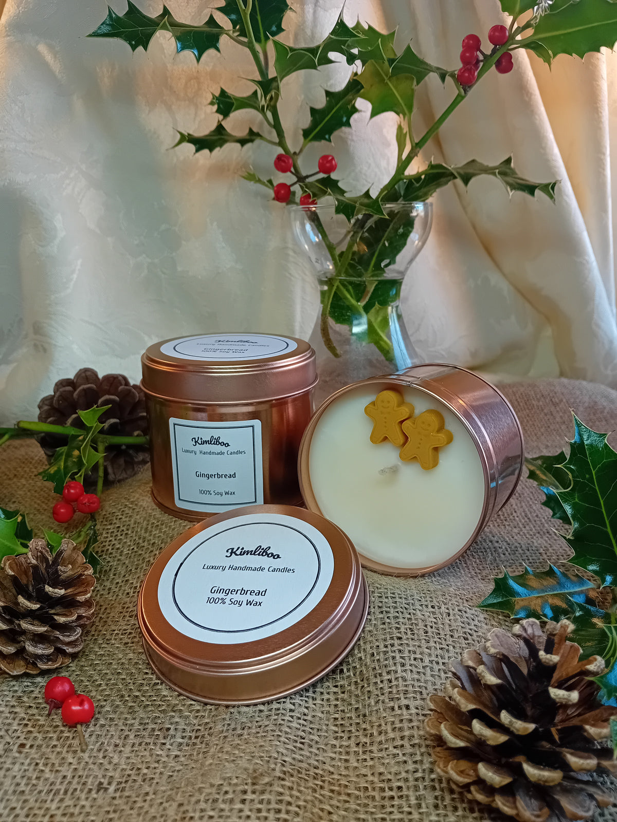 Large rose gold tin with gingerbread fragranced candle and two gingerbread man wax decorations